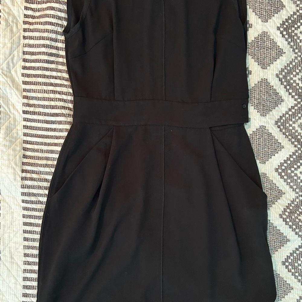 Aritzia Black Sleeveless Dress with open back and pockets. Size 8.